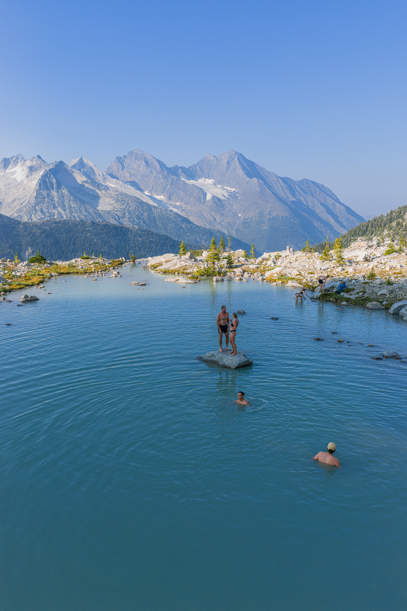 A cold swim in an alpine lake