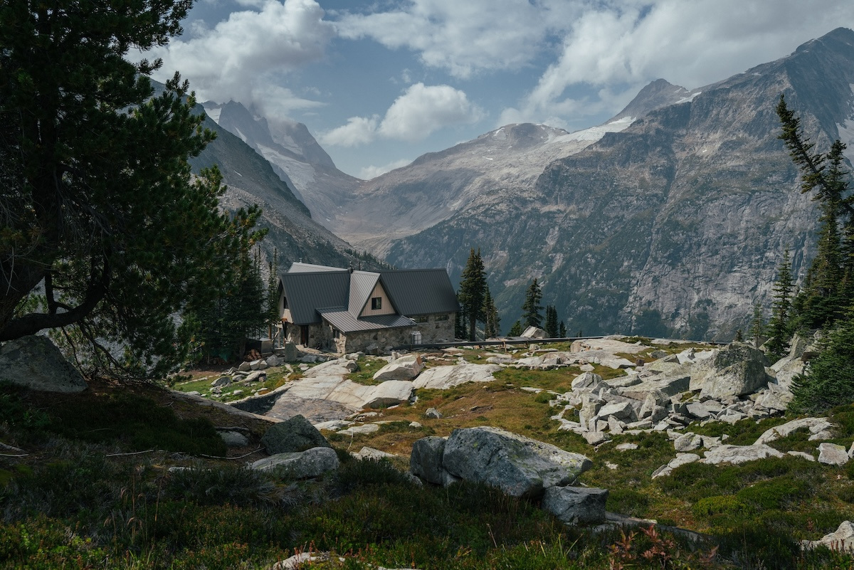 The lodge in summer, set among granite and meadow