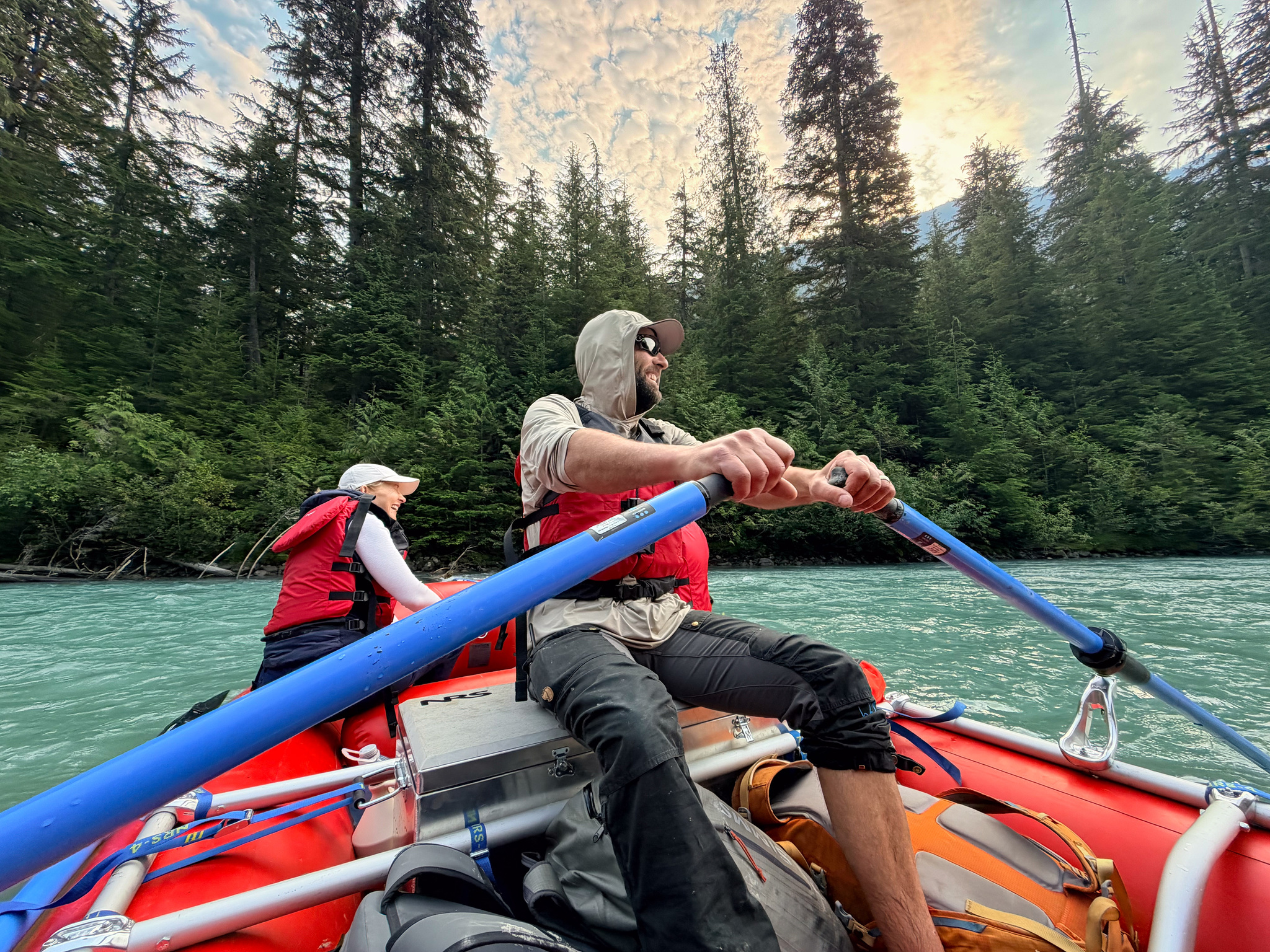 Rowing the raft through milky glacial water