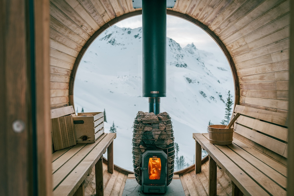 The sauna's round window onto the snowfields