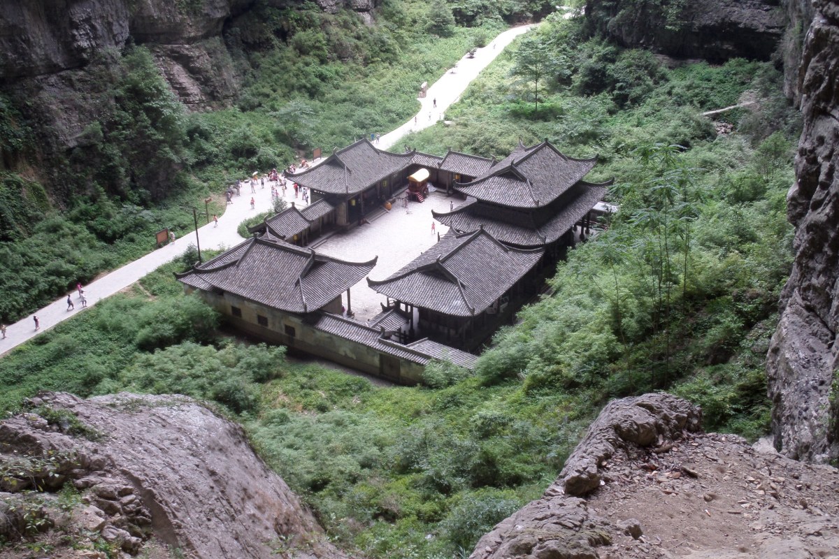 The Tianfu post station complex on the floor of Wulong's Three Natural Bridges gorge