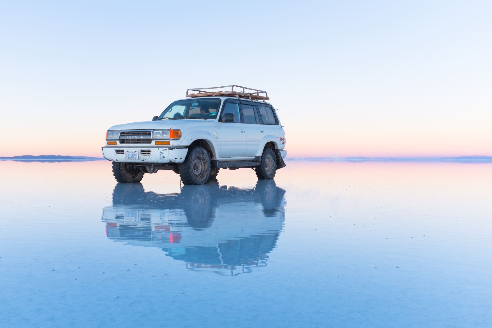 The flooded Salar de Uyuni mirroring the sky, Bolivia