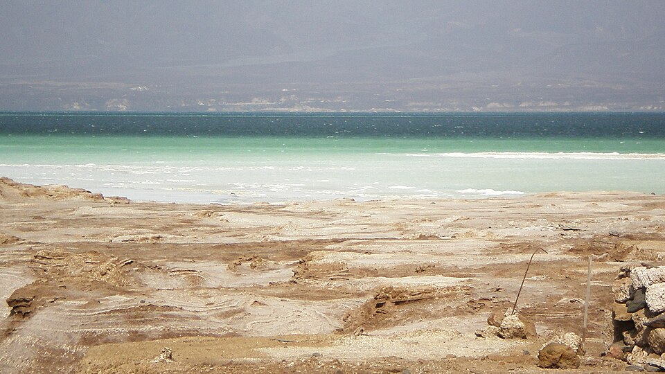 The turquoise brine and white salt shore of Lac Assal, the lowest point in Africa, Djibouti