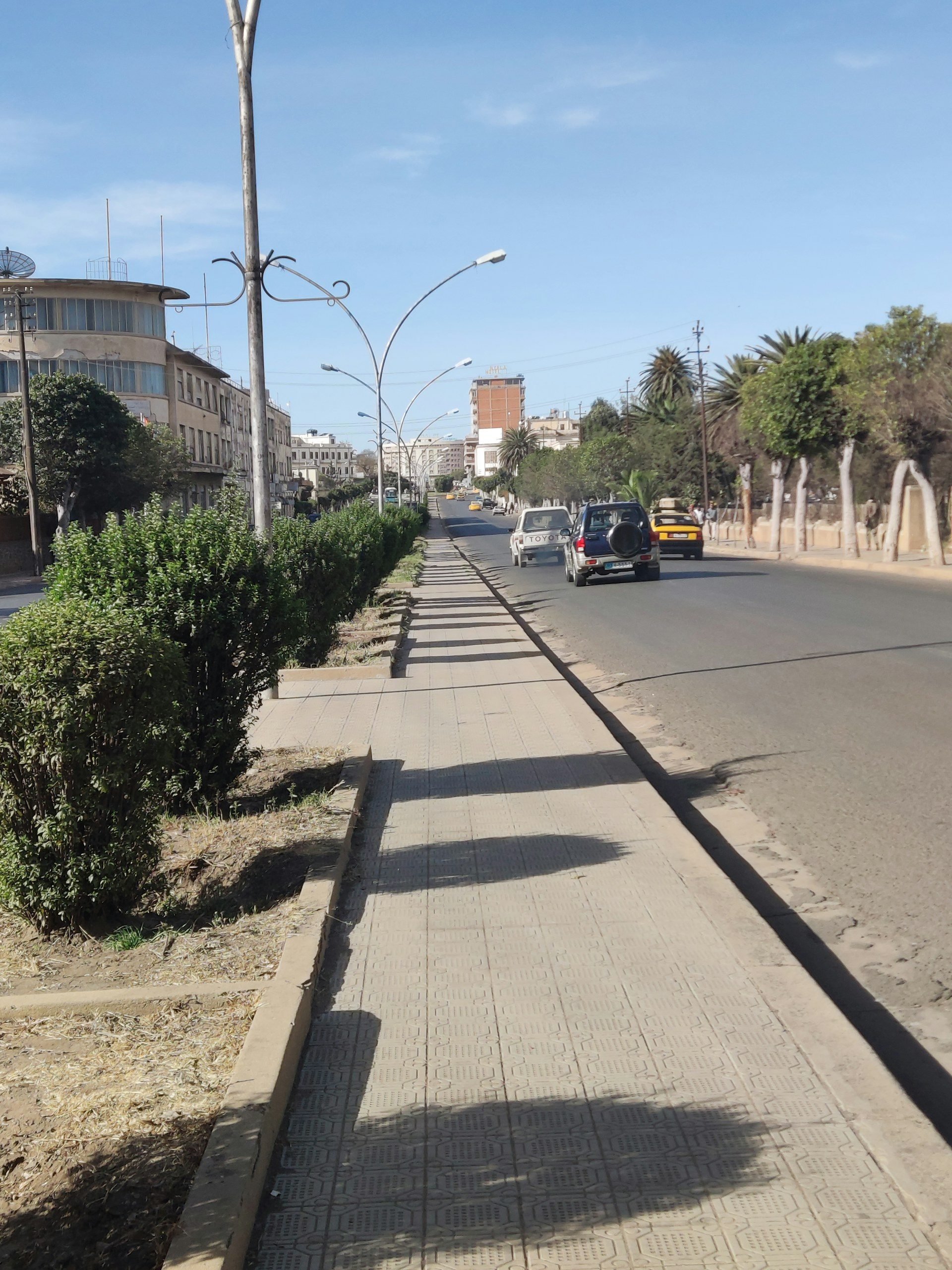 Asmara avenue lined with Italian modernist buildings, Eritrea