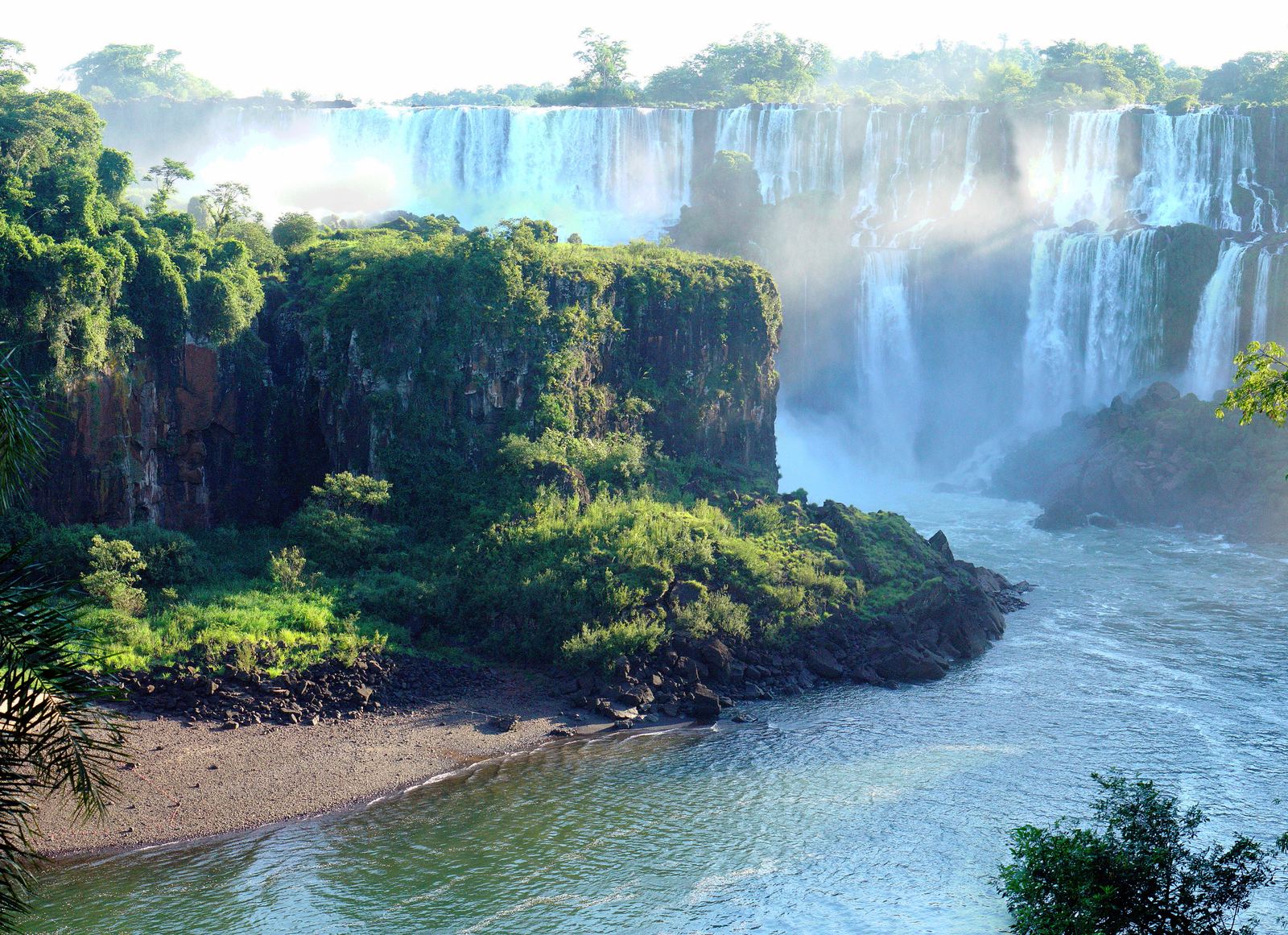 The cascades of Iguazú Falls thundering through the rainforest