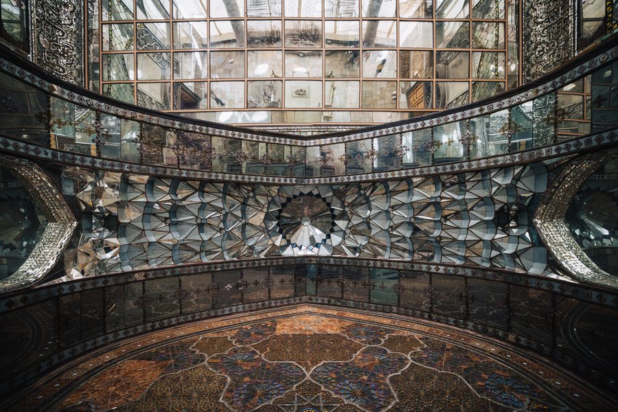 The mirrored ceiling and carpets of a hall in Golestan Palace, Tehran