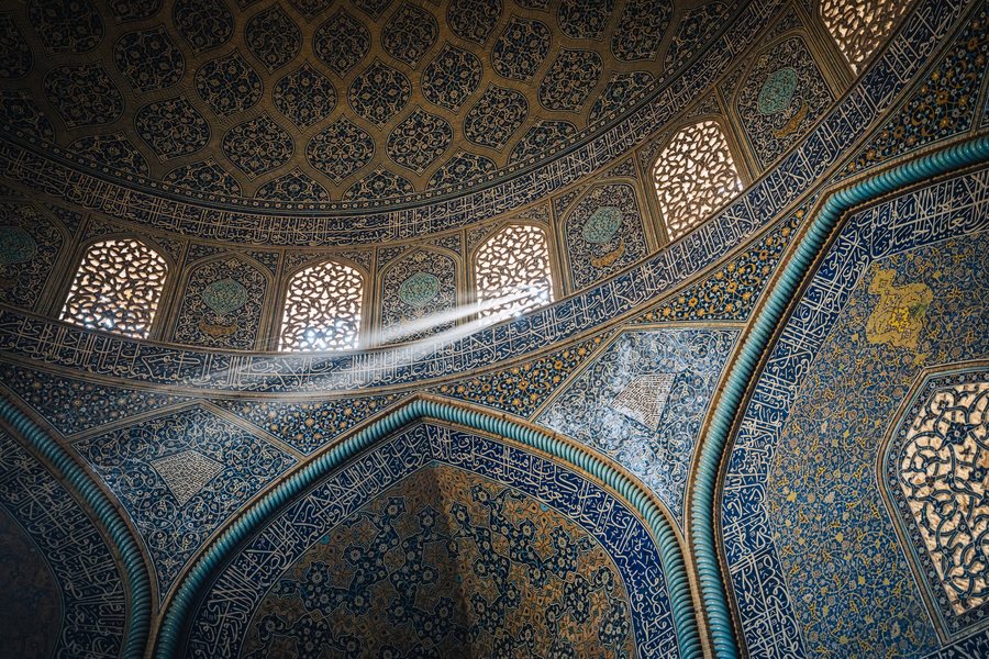 A shaft of light crossing the tiled dome of the Sheikh Lotfollah Mosque, Naqsh-e Jahan Square, Isfahan