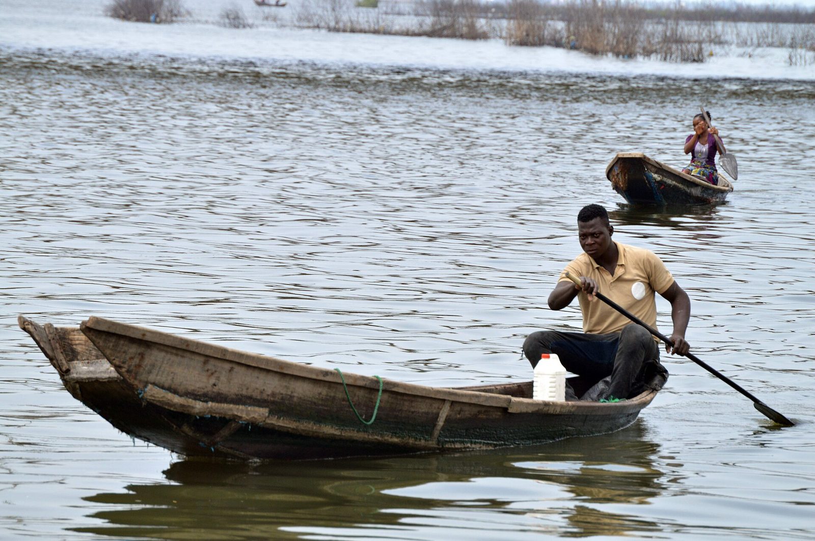 Canoes on the lagoon at Makoko, the stilt settlement of Lagos, Nigeria