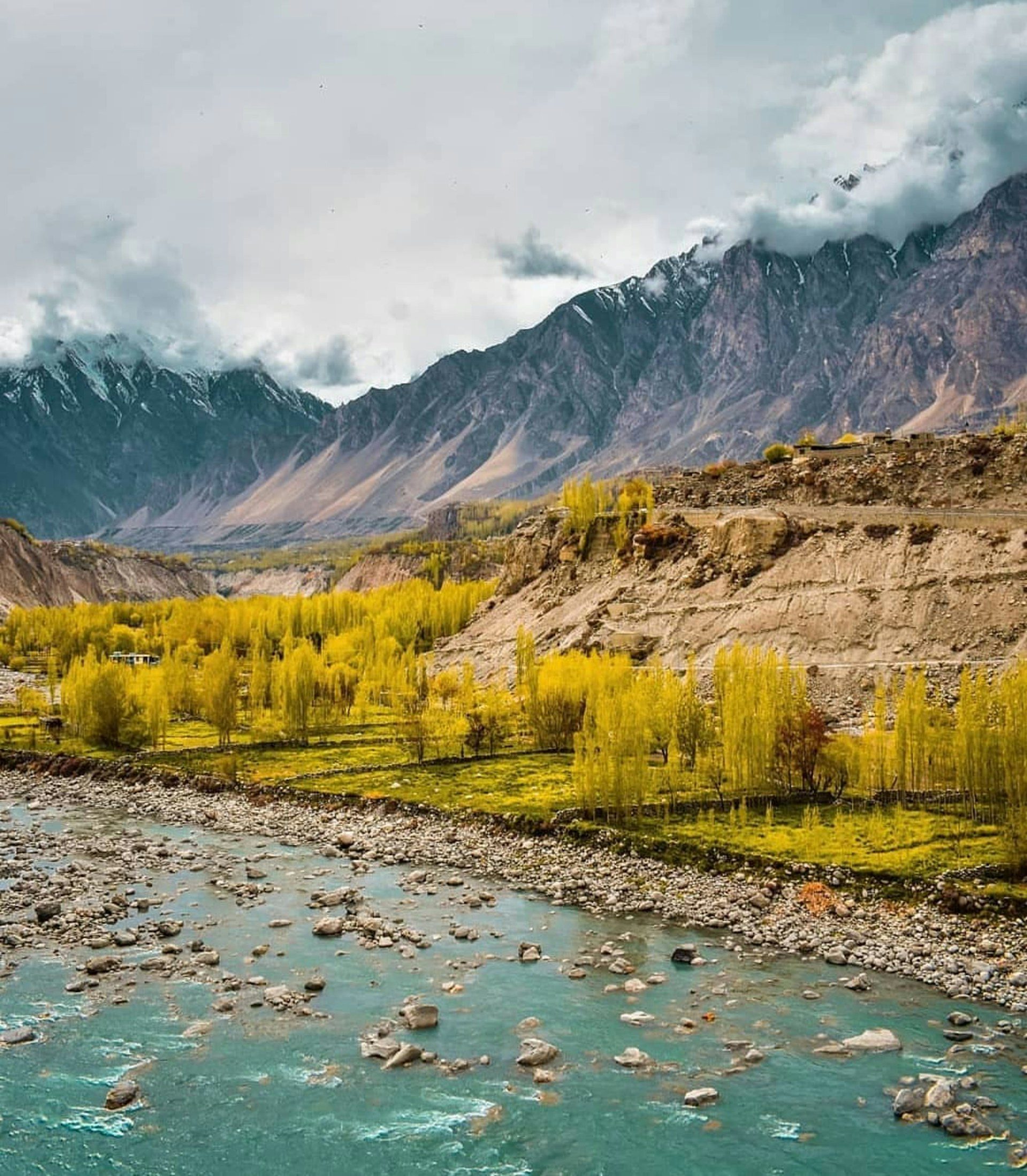 Hunza Valley autumn colors over a glacial river, Karakoram Pakistan