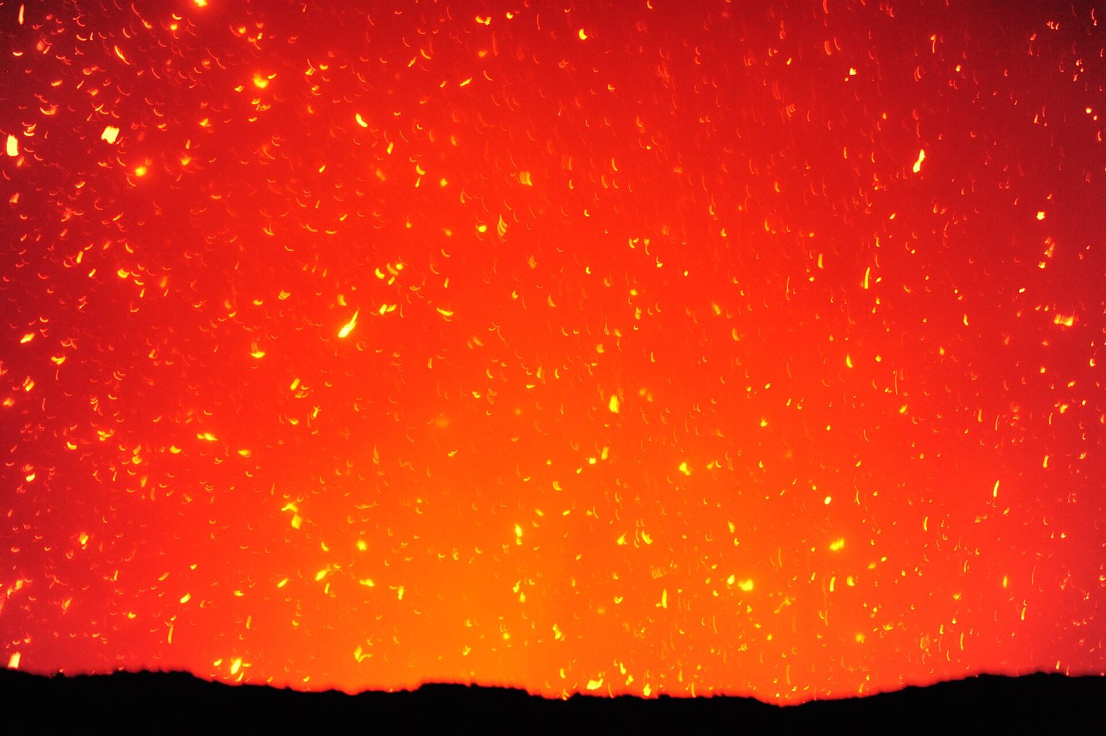 Lava bursting from Mount Yasur at night, Tanna Island, Vanuatu