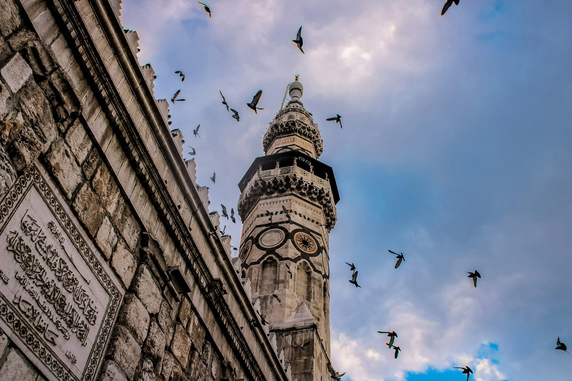 Birds in flight over the Umayyad Mosque, Damascus, Syria