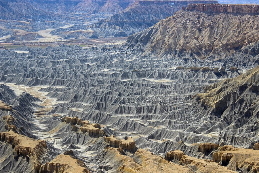The grey badlands below Moonscape Overlook at the Blue Gate, Utah
