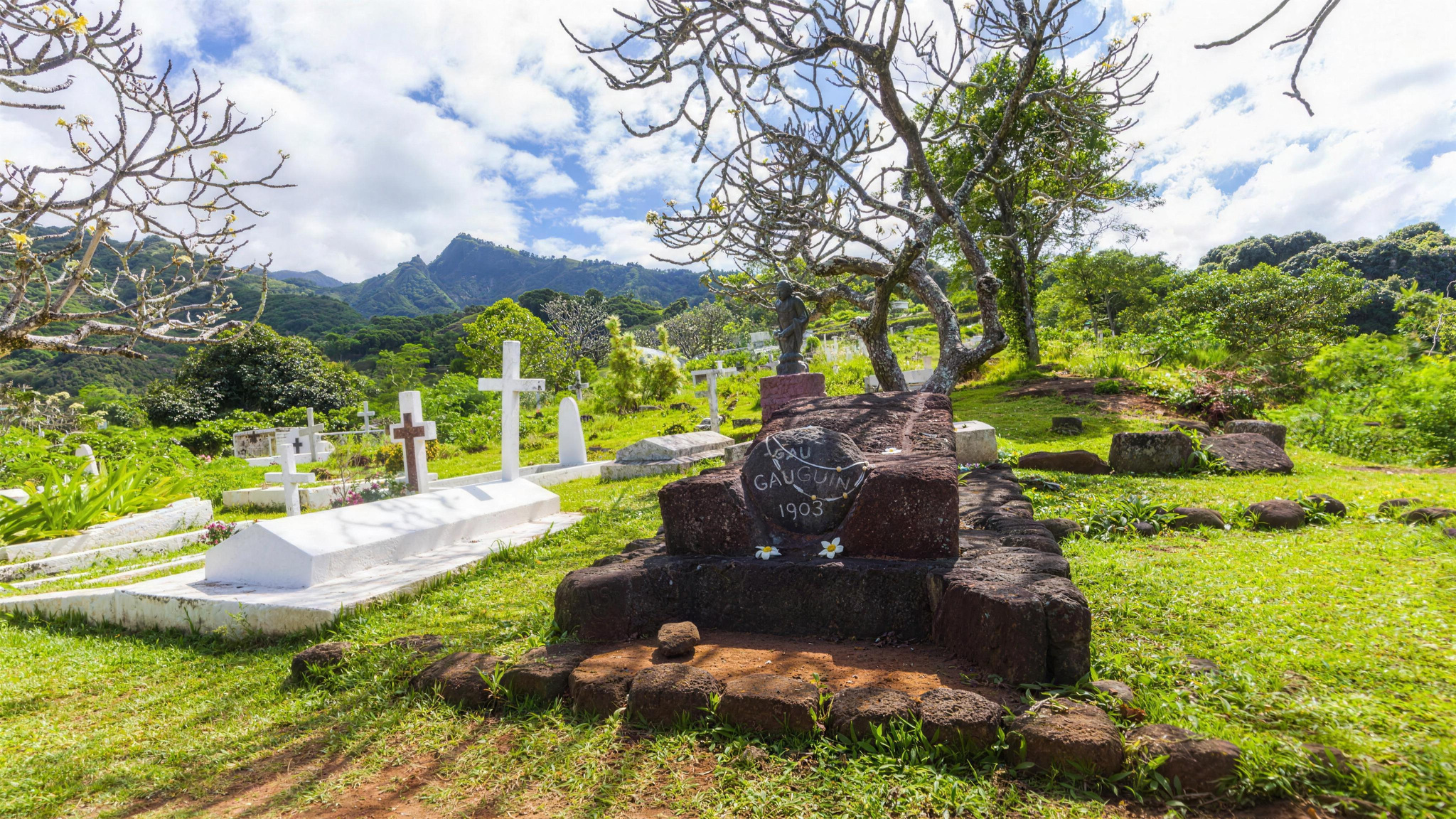 The hillside cemetery above Atuona, with Paul Gauguin's grave under a frangipani tree