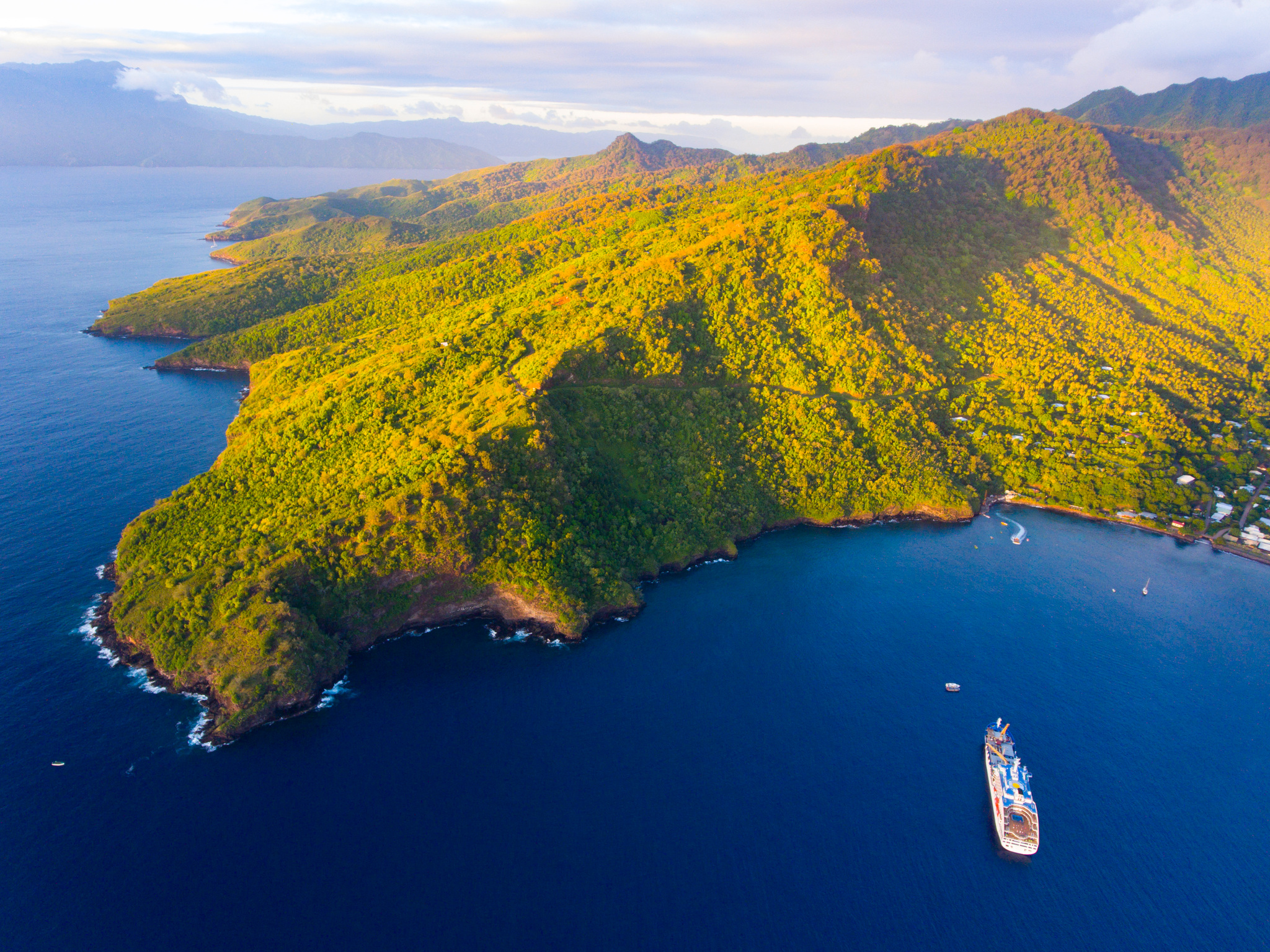 Aranui 5 off the green ridges and bays of Tahuata, from the air