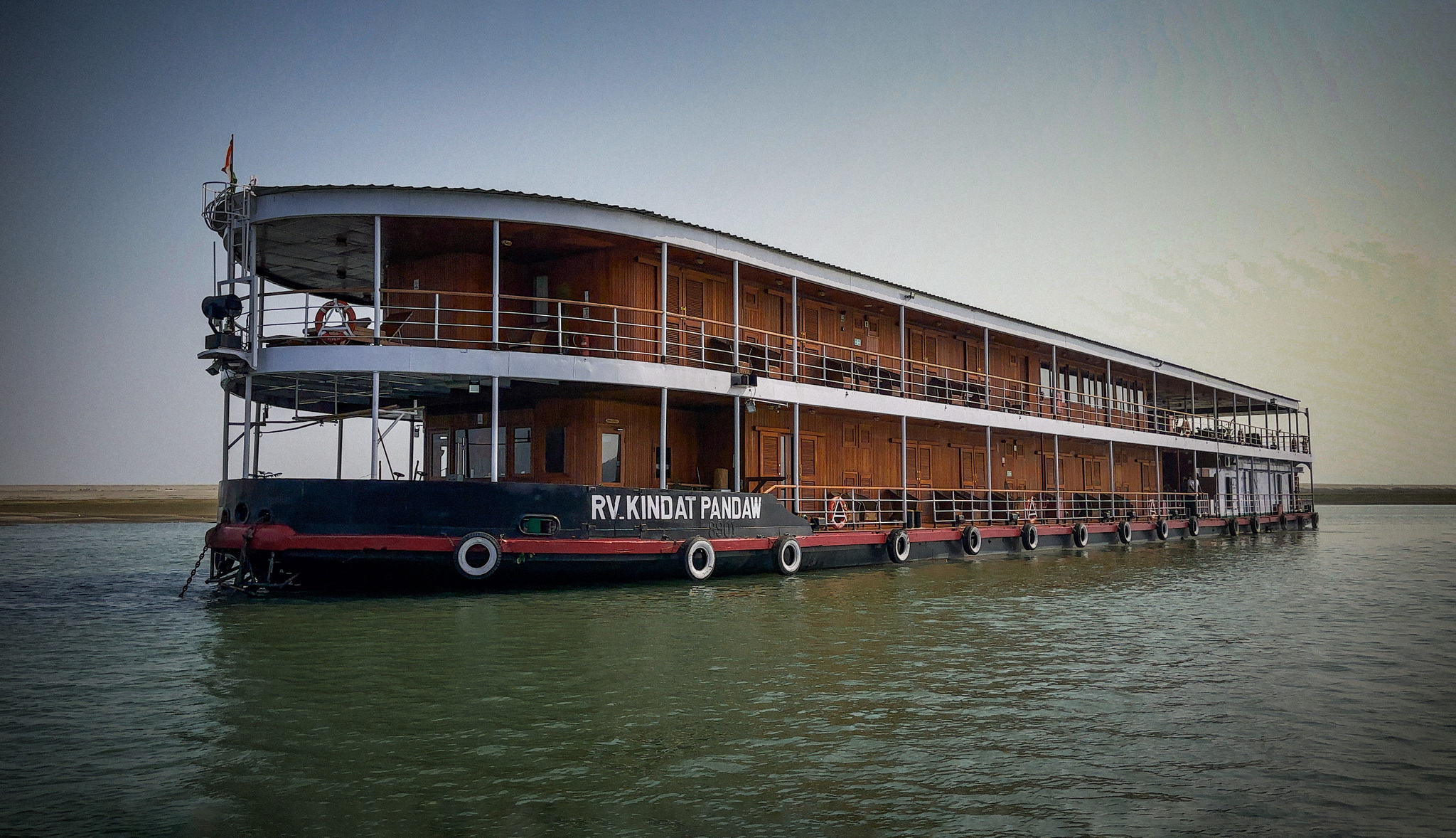 The bow of RV Kindat Pandaw, with her name on the hull