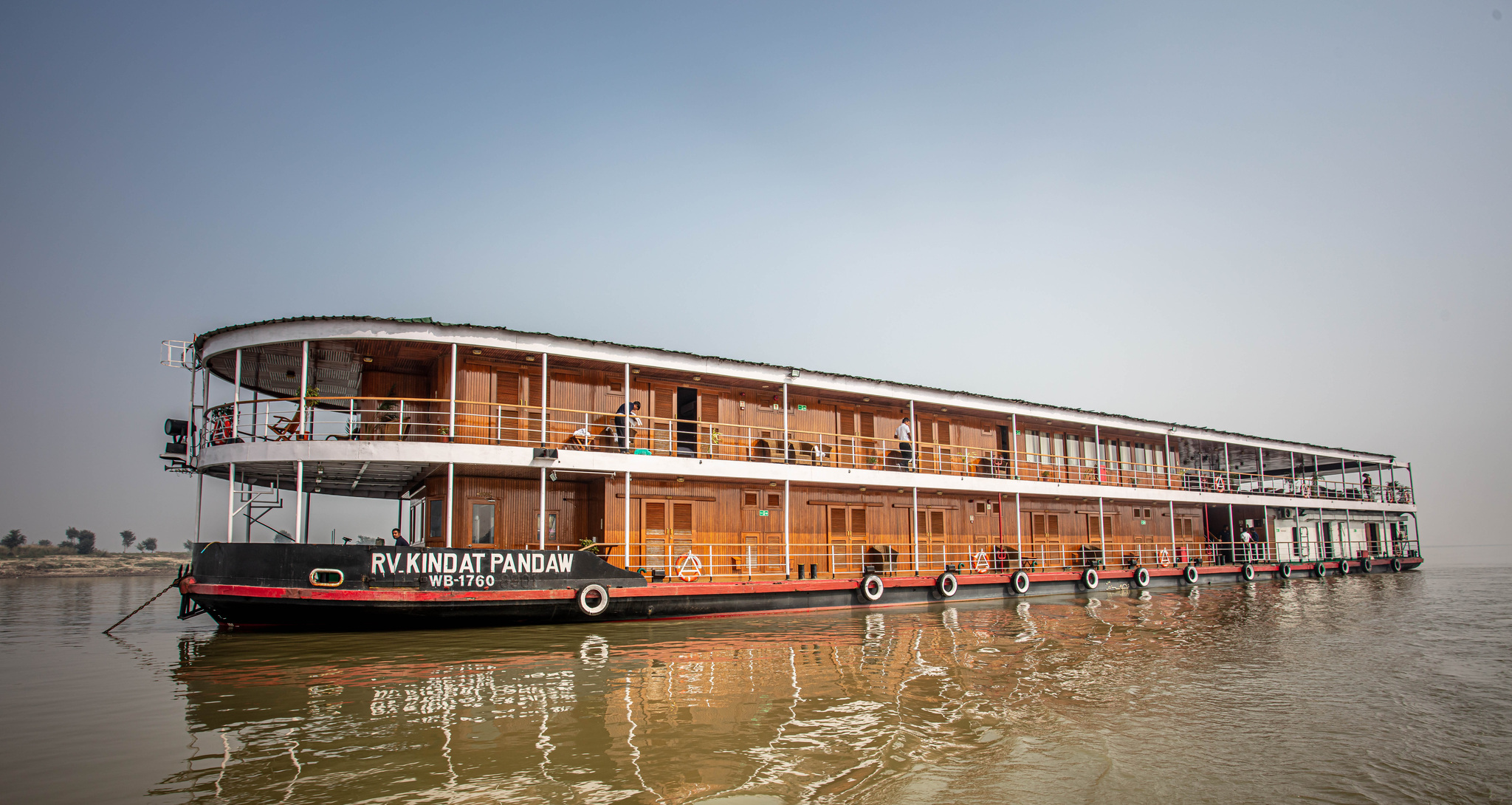 RV Kindat Pandaw under way on a calm river