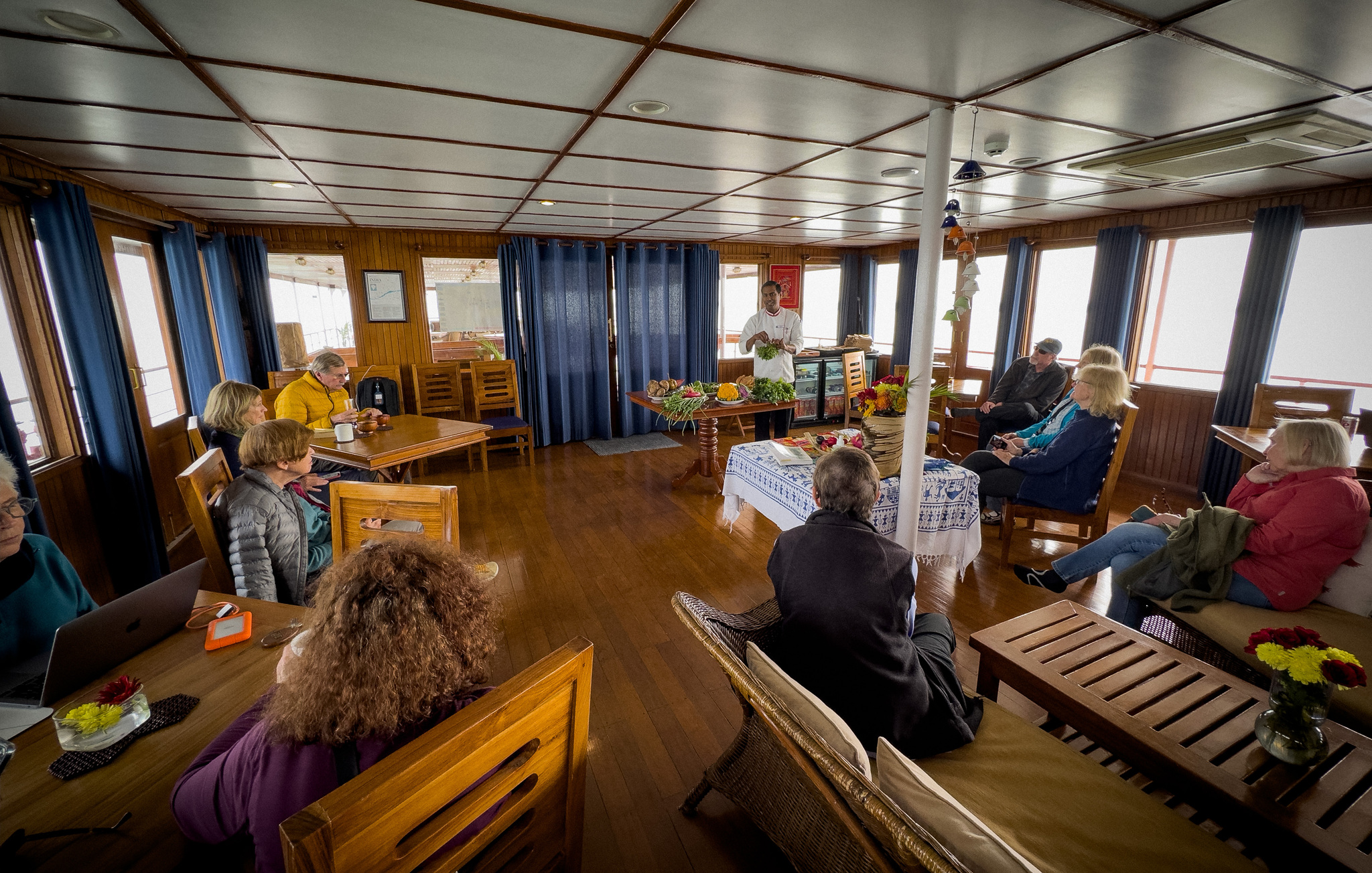 Guests reading and talking in the saloon