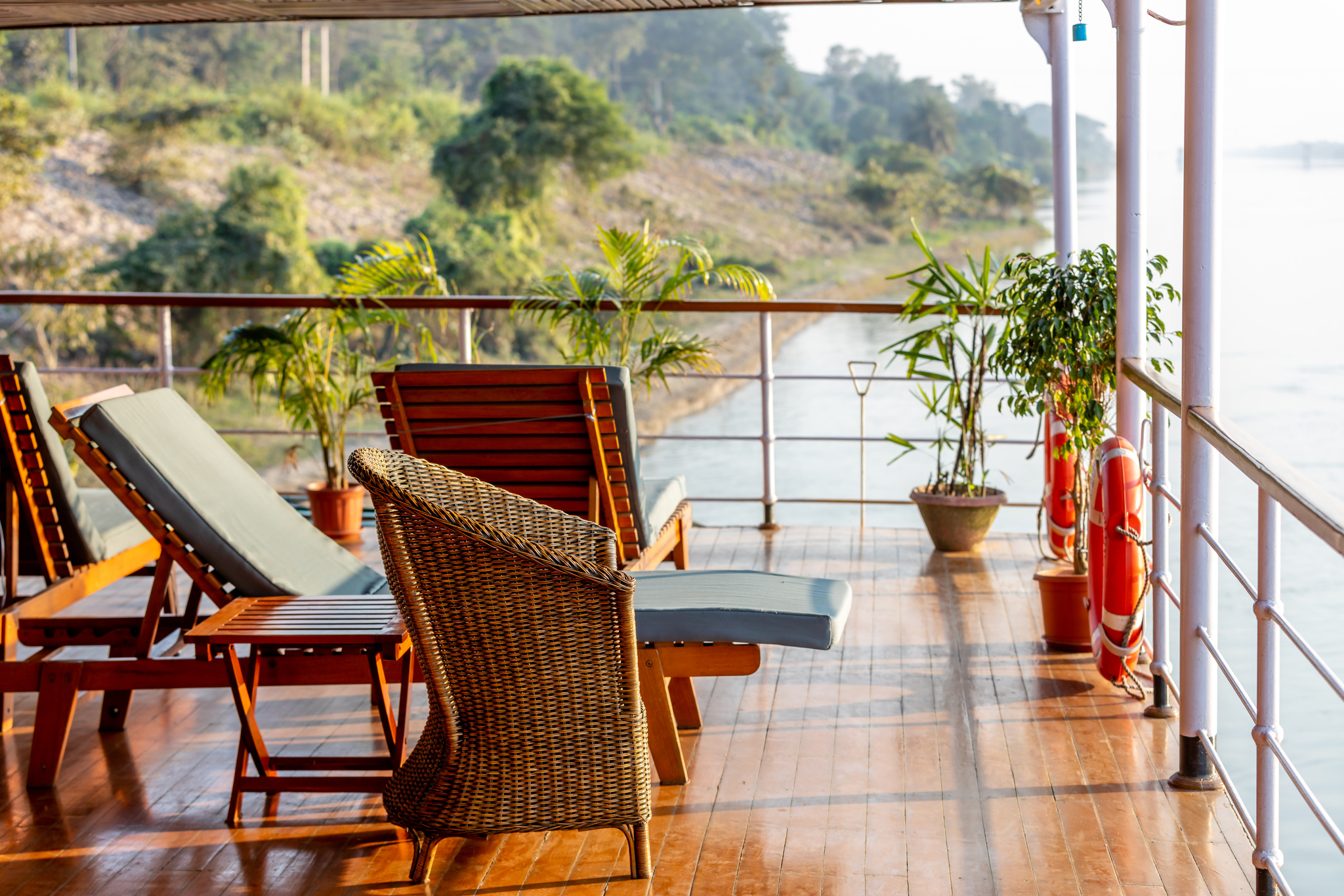 Loungers and rattan chairs on the open deck