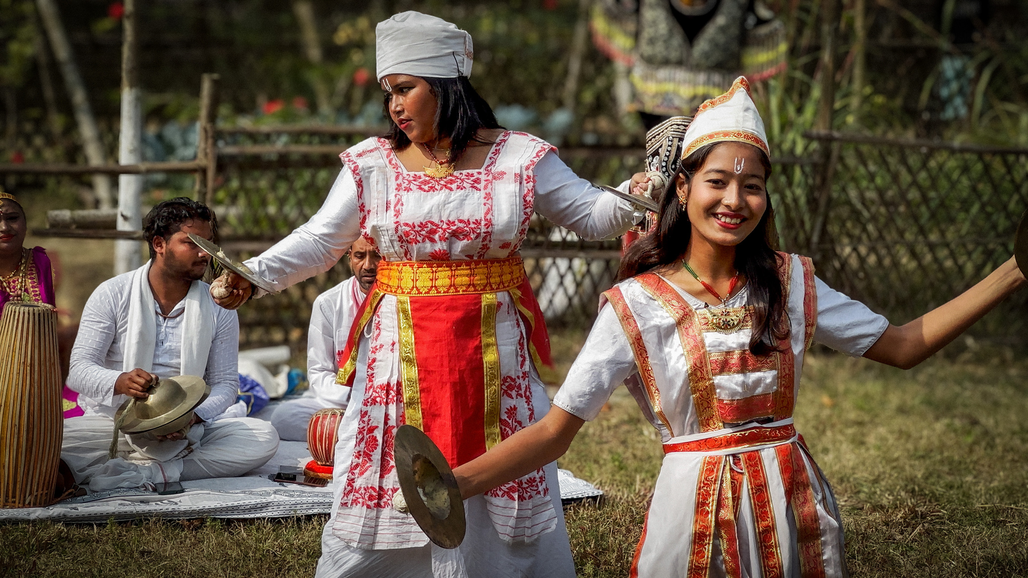 Dancers and musicians performing in a village