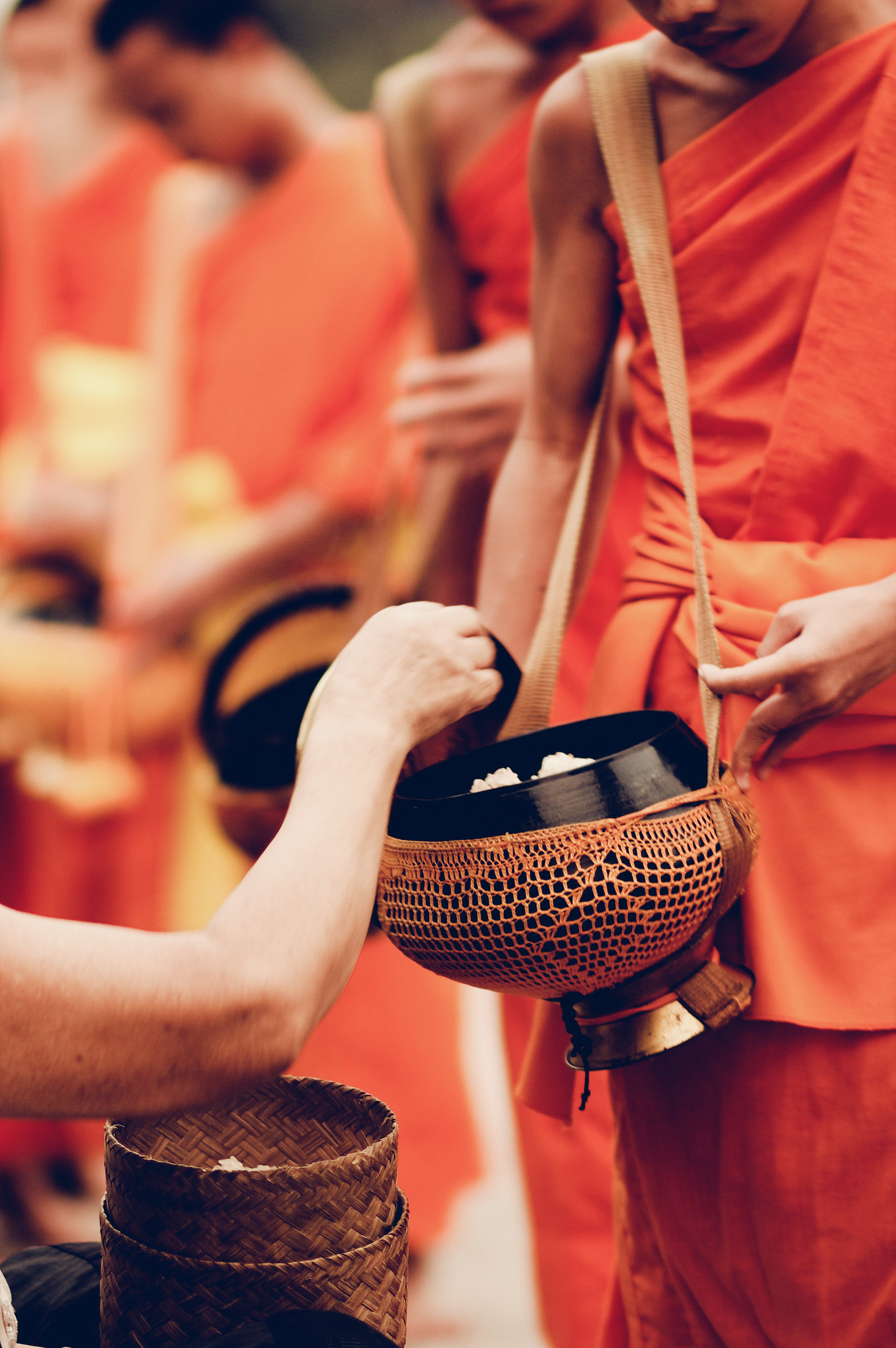 Sticky rice offered to monks at the dawn alms round