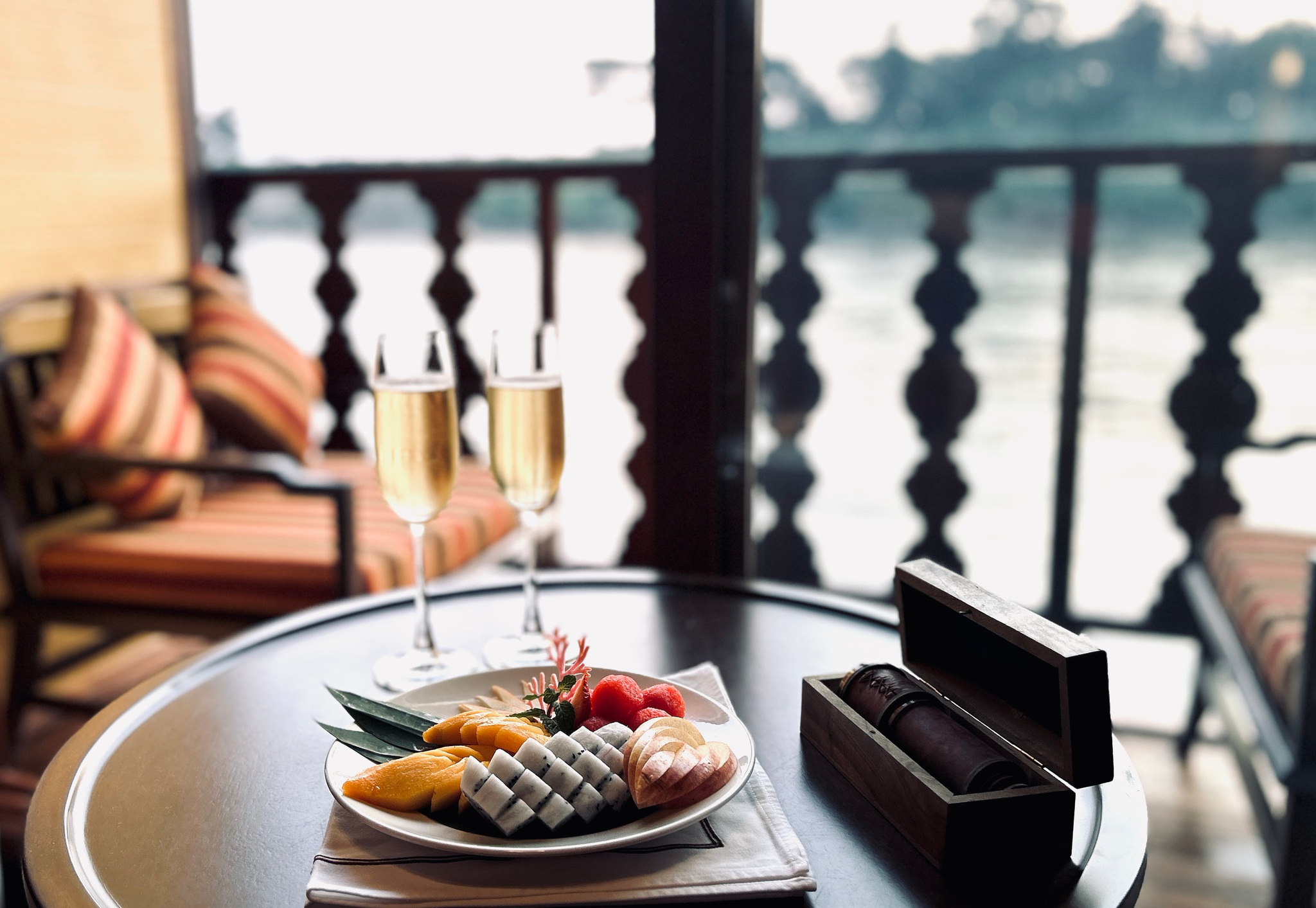 Sparkling wine and fruit on the balcony