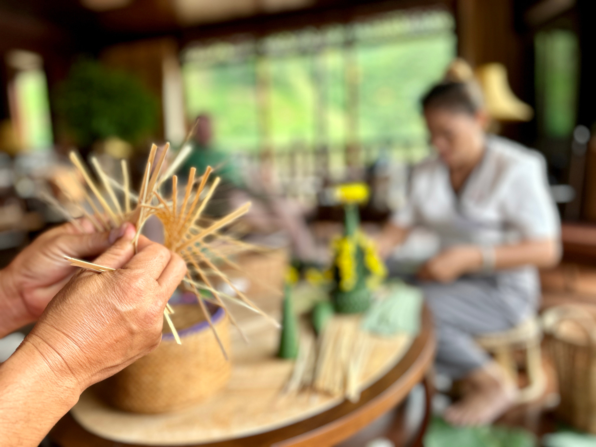 A bamboo weaving demonstration in the lounge