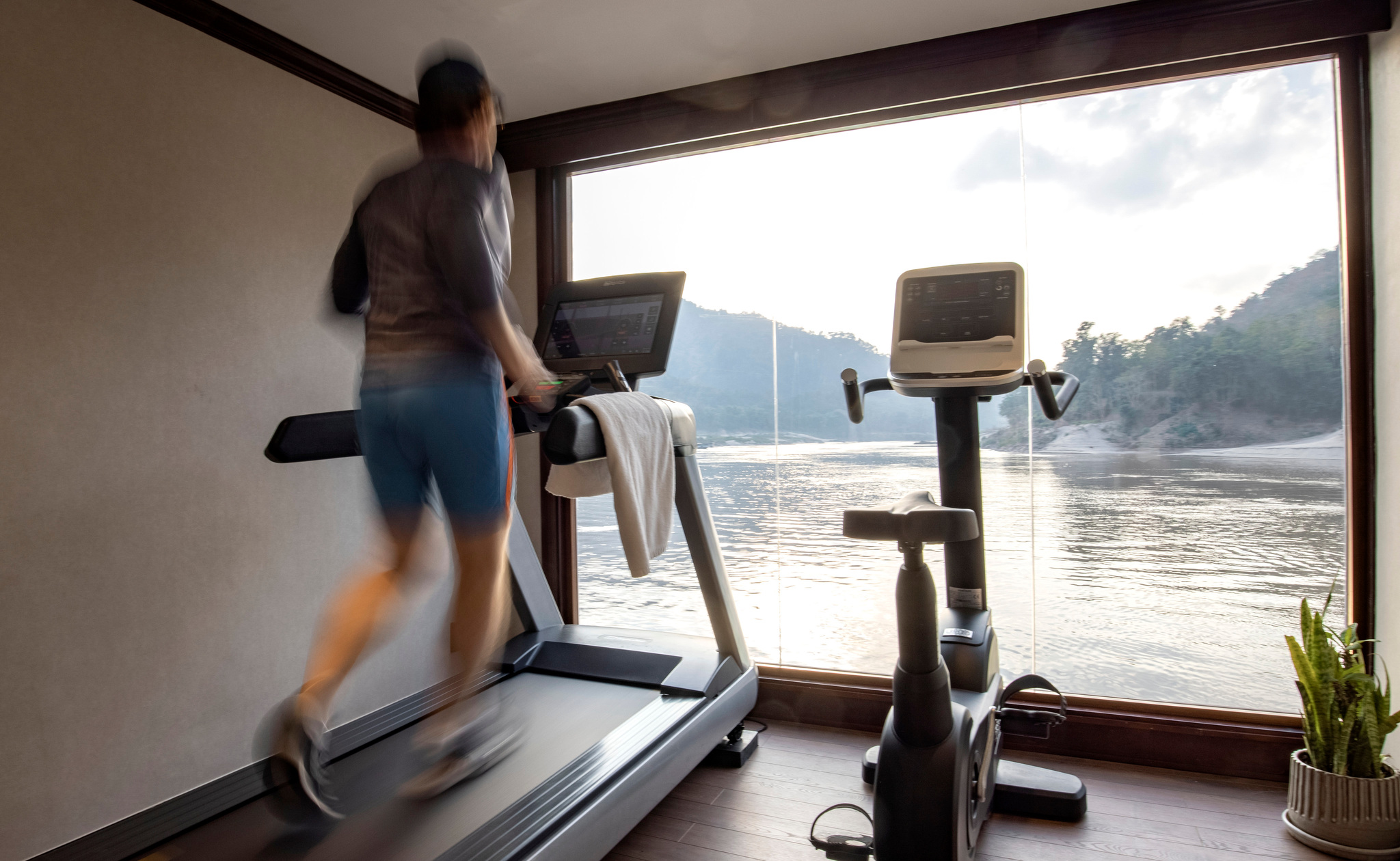 The fitness room, with the river beyond the windows