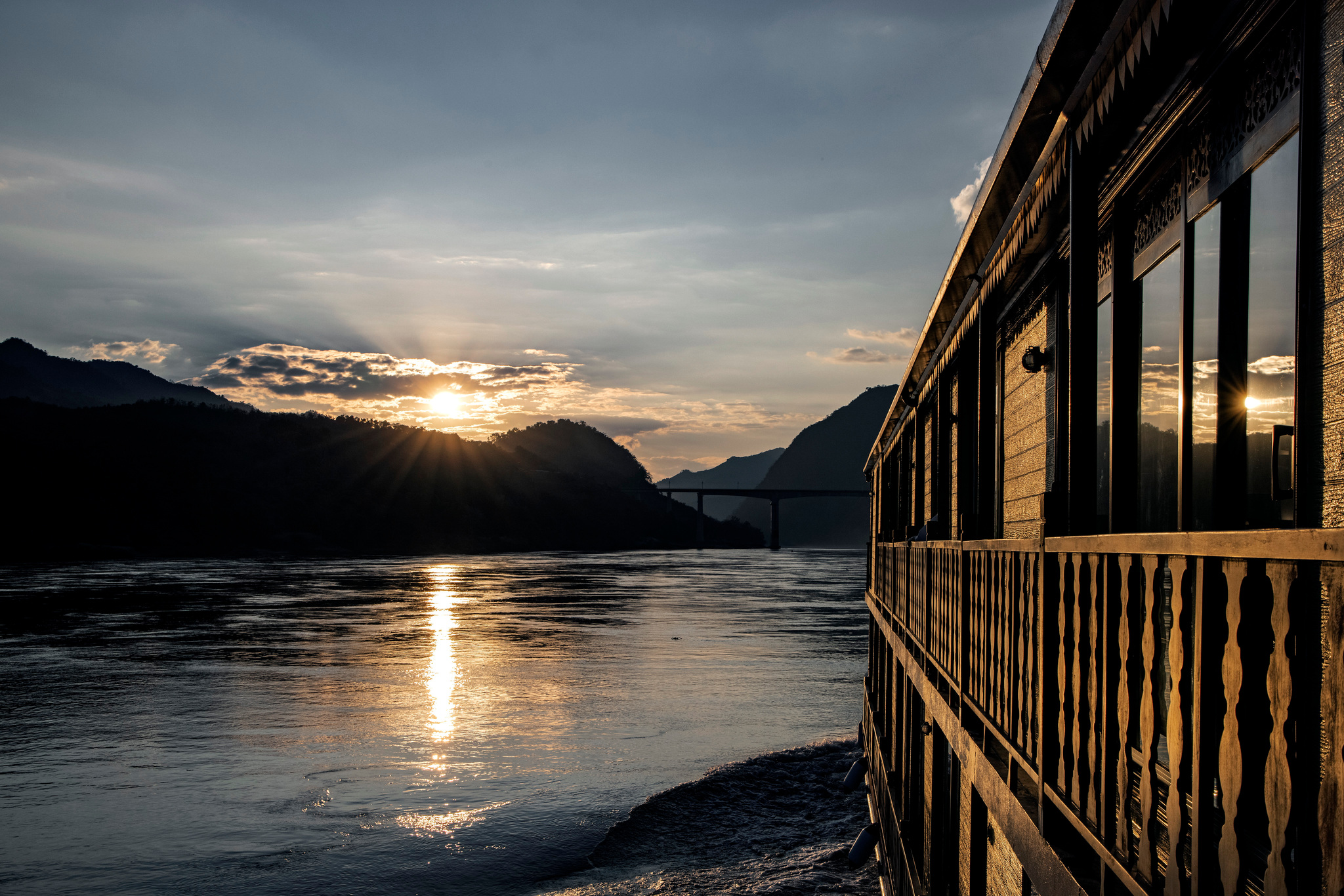 Sunset on the Mekong along the ship's rail