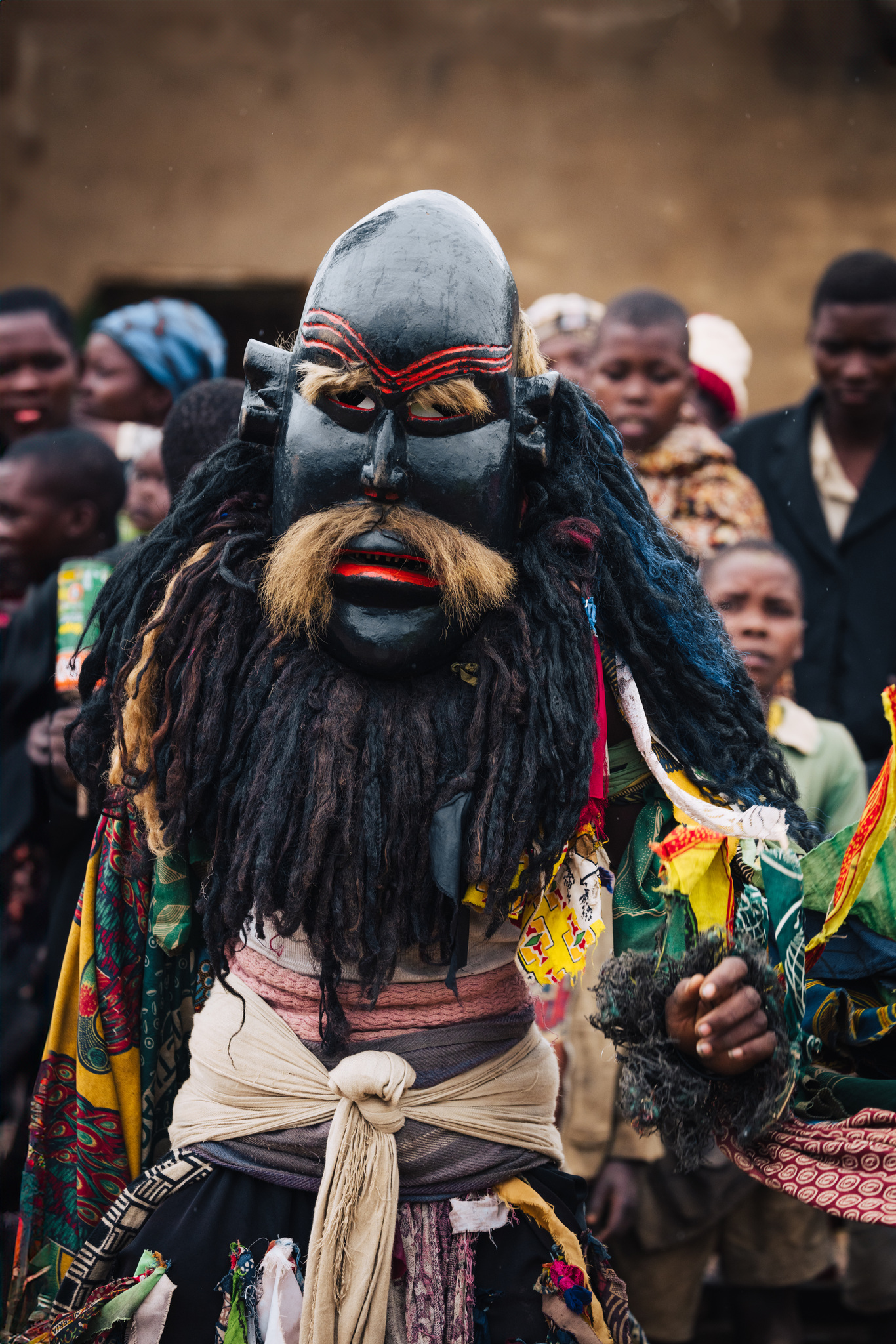 A bearded Gule Wamkulu mask, close up