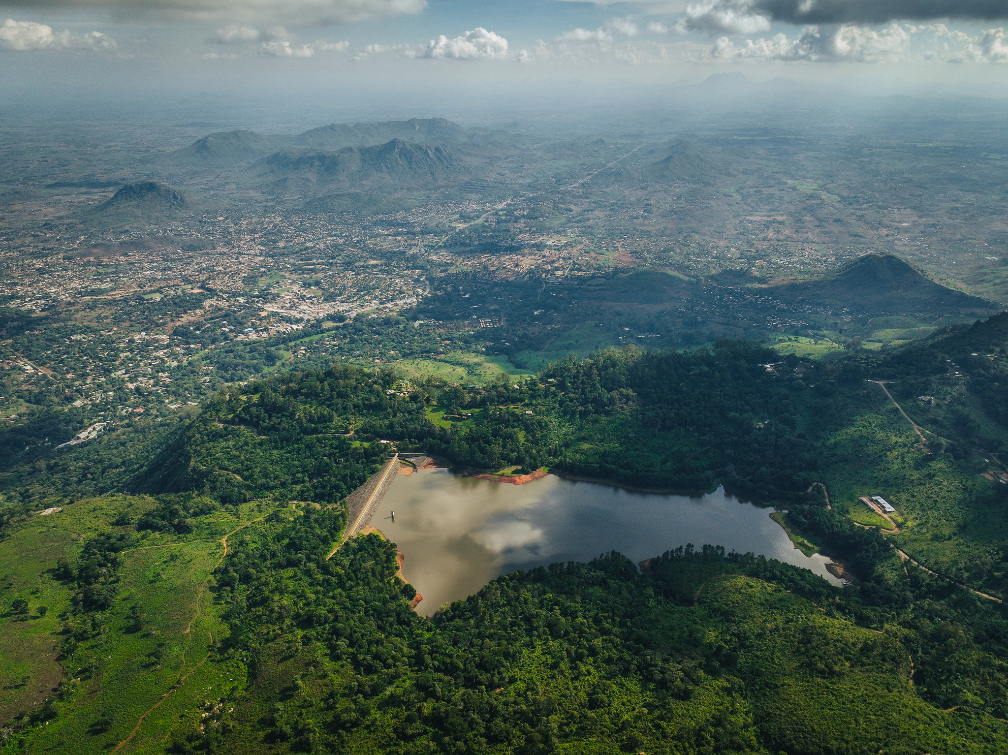 The Mulunguzi Dam on the Zomba Plateau from the air, with Zomba town below