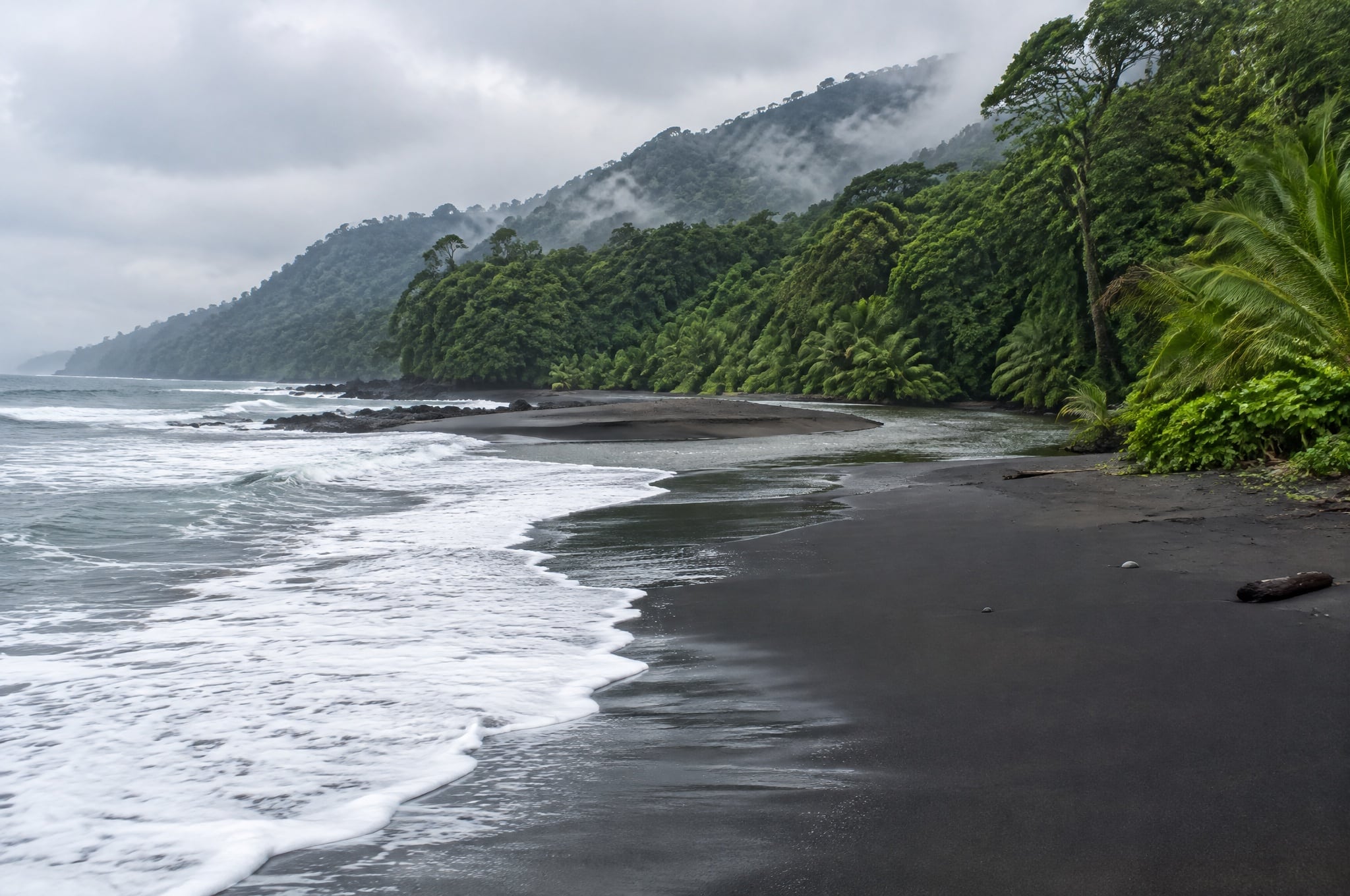 The black-sand coast at Ureca, Bioko, Equatorial Guinea