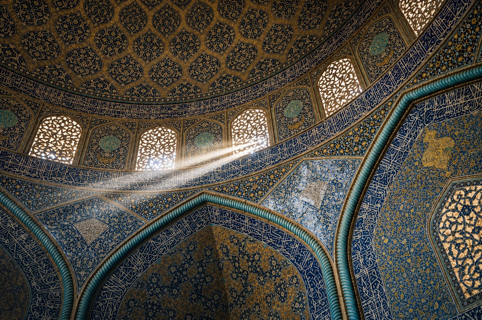 A shaft of light crossing the tiled dome of the Sheikh Lotfollah Mosque, Naqsh-e Jahan Square, Isfahan