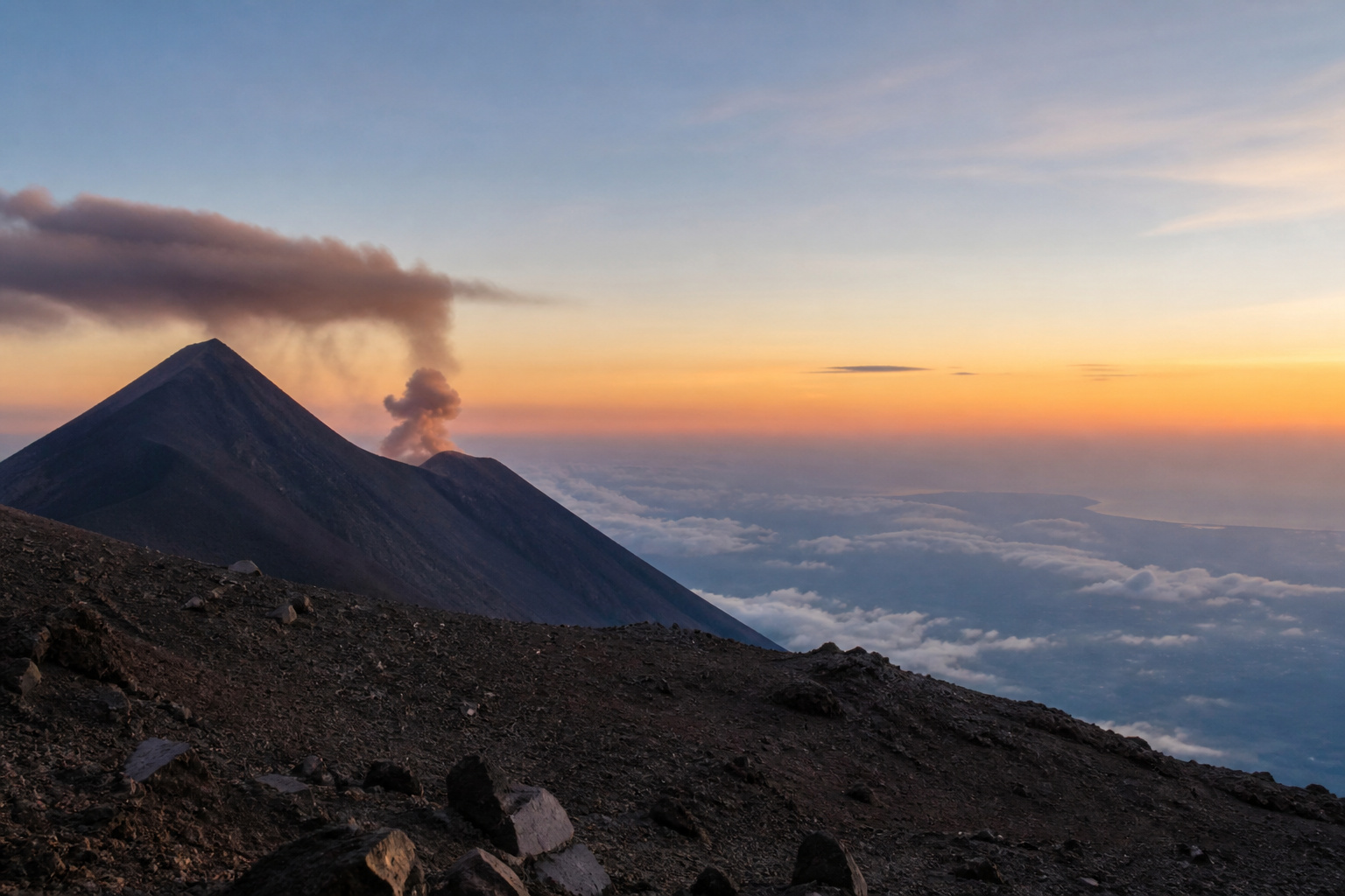 Acatenango summit sunrise · return to Antigua