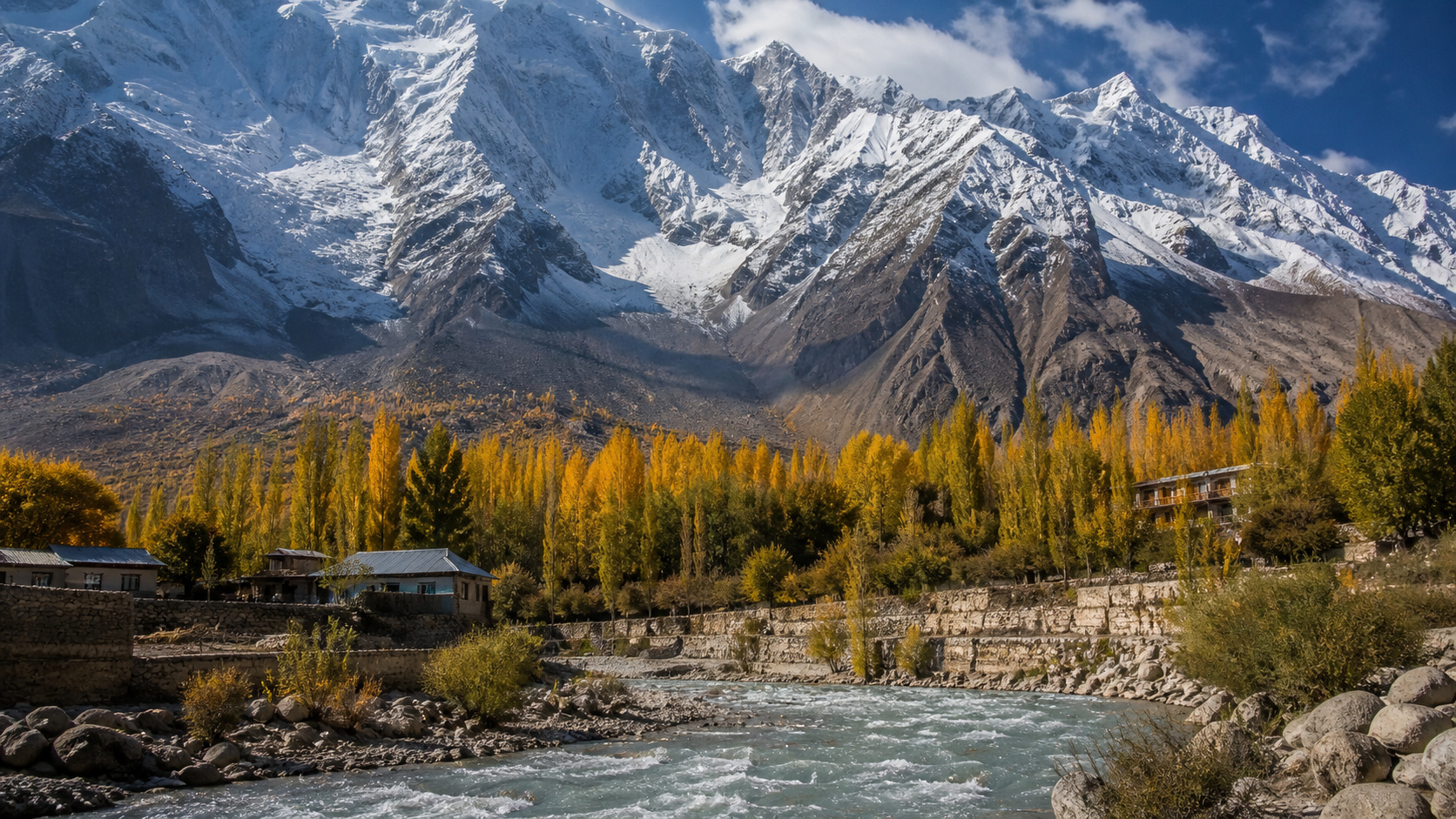 Hunza Valley autumn foliage with Karakoram mountains in Pakistan