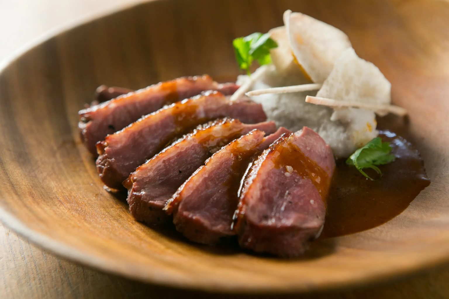 Seared duck breast with achiote sauce and taro root