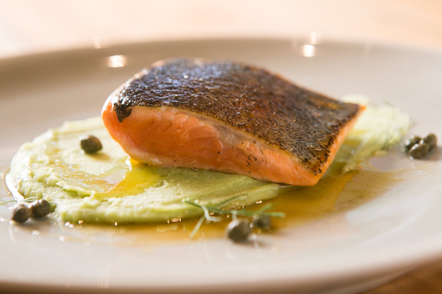 Pan-seared trout with caper butter and mashed fava beans