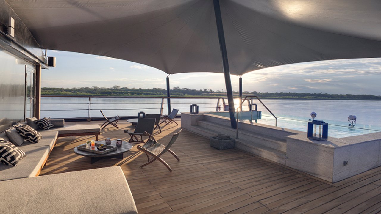 The top deck under its canopy at dusk